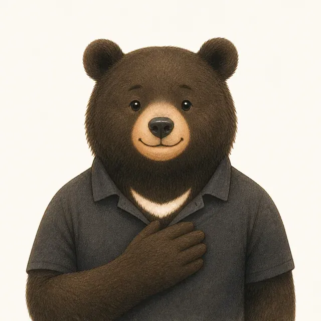 胸に手を当てて寄り添う表情のコーチ（クマのキャラクター）